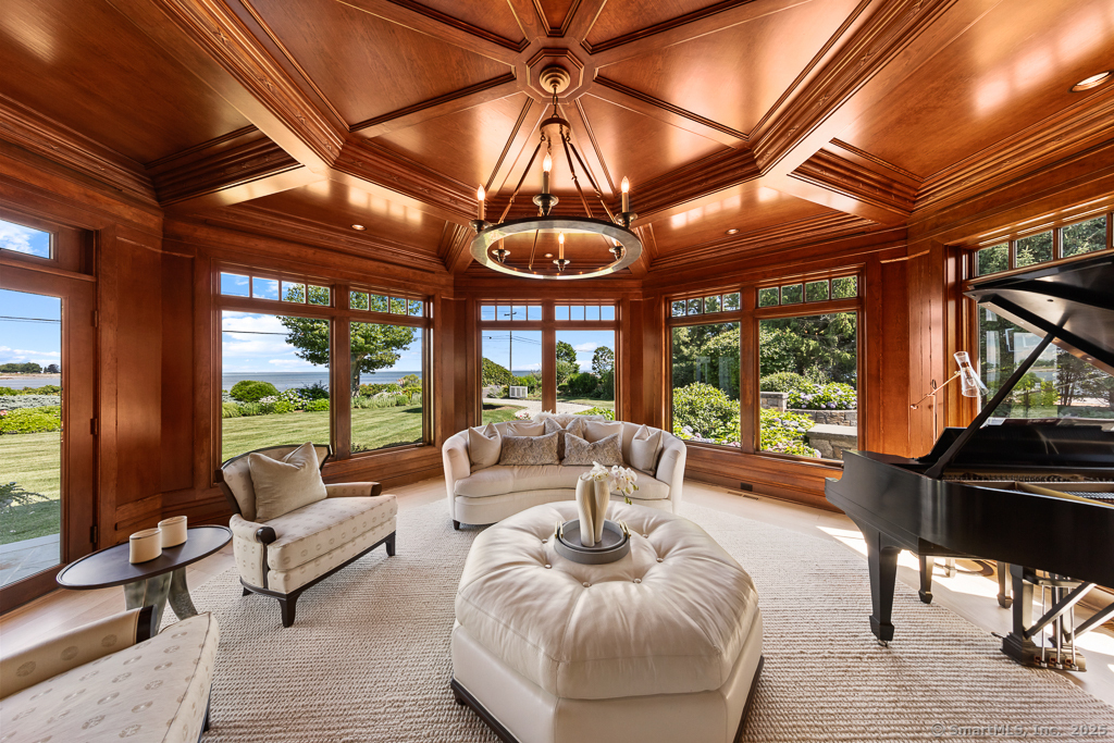 260 Hillspoint Road Westport, CT 06880 - Photo 11 of 40 a living room with furniture and a large window
