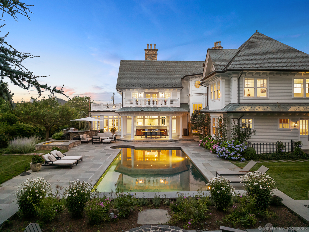 260 Hillspoint Road Westport, CT 06880 - Photo 2 of 40 a view of a house with swimming pool and furniture