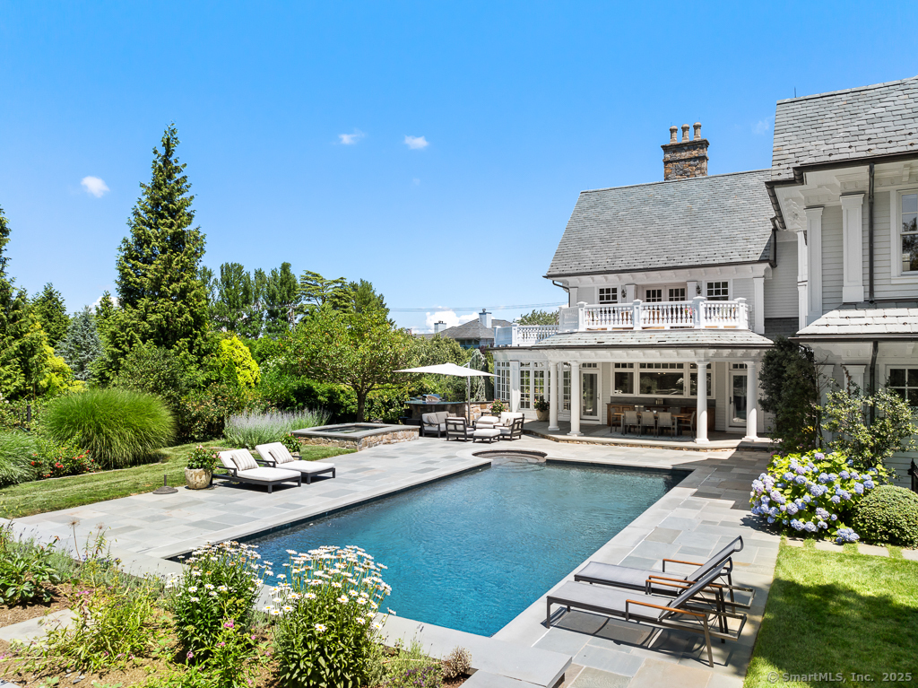 260 Hillspoint Road Westport, CT 06880 - Photo 30 of 40 a view of a house with garden space and sitting area