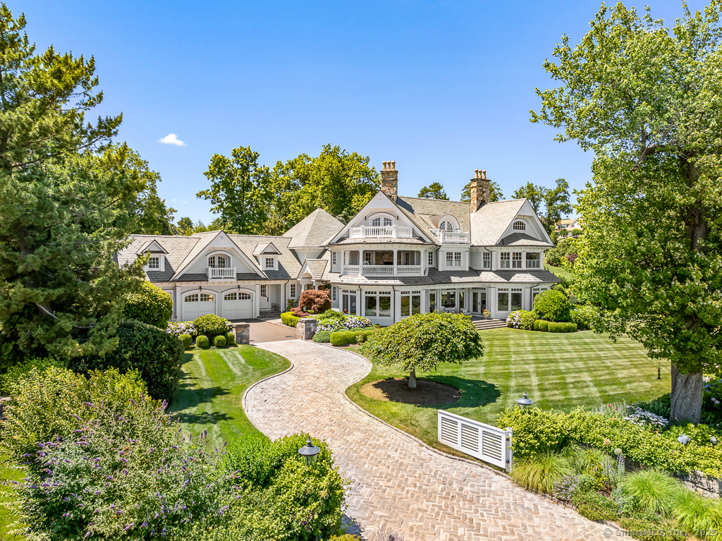 260 Hillspoint Road Westport, CT 06880 - Photo 33 of 40 a front view of a house with a yard