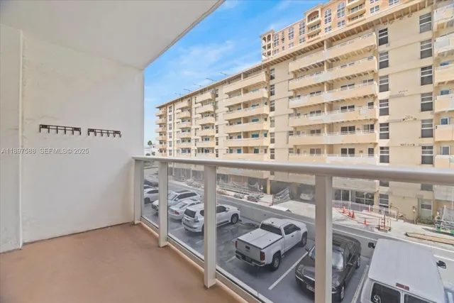 a view of a tall buildings with many windows
