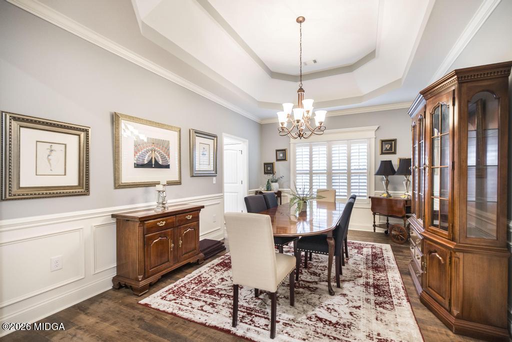 137 Shady Oak Drive Perry, GA 31069 - Photo 12 of 37 a view of a dining room with furniture window and wooden floor