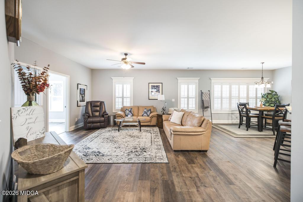 137 Shady Oak Drive Perry, GA 31069 - Photo 14 of 37 a living room with furniture and wooden floor