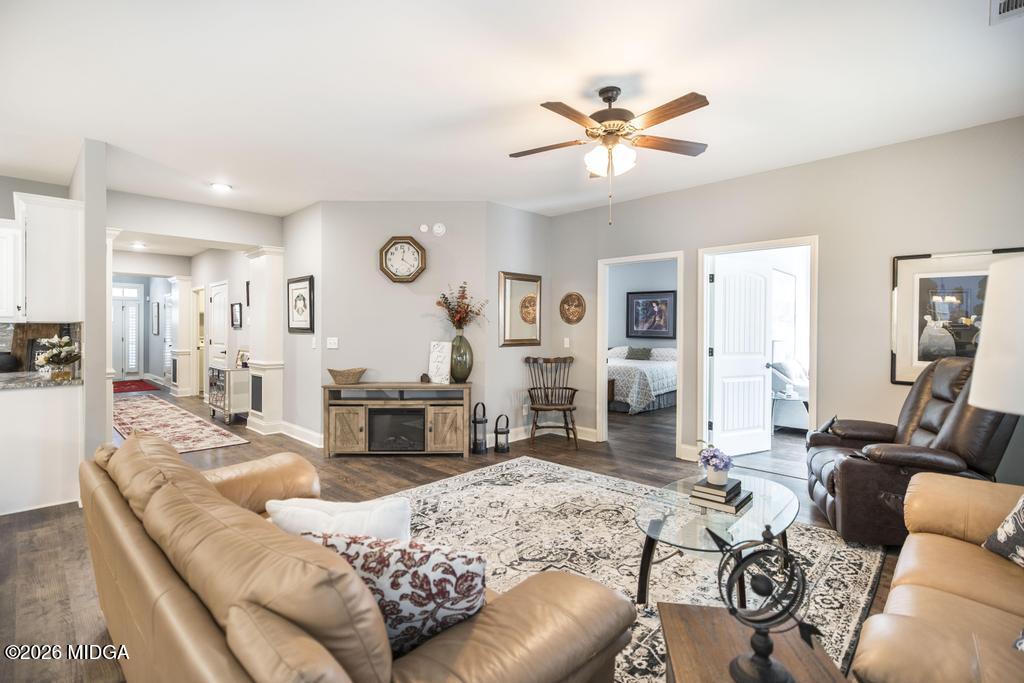 137 Shady Oak Drive Perry, GA 31069 - Photo 15 of 37 a living room with furniture and a large window