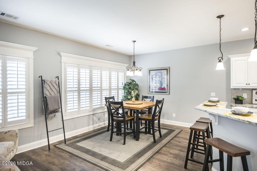 137 Shady Oak Drive Perry, GA 31069 - Photo 17 of 37 a view of a dining room with furniture window and outside view