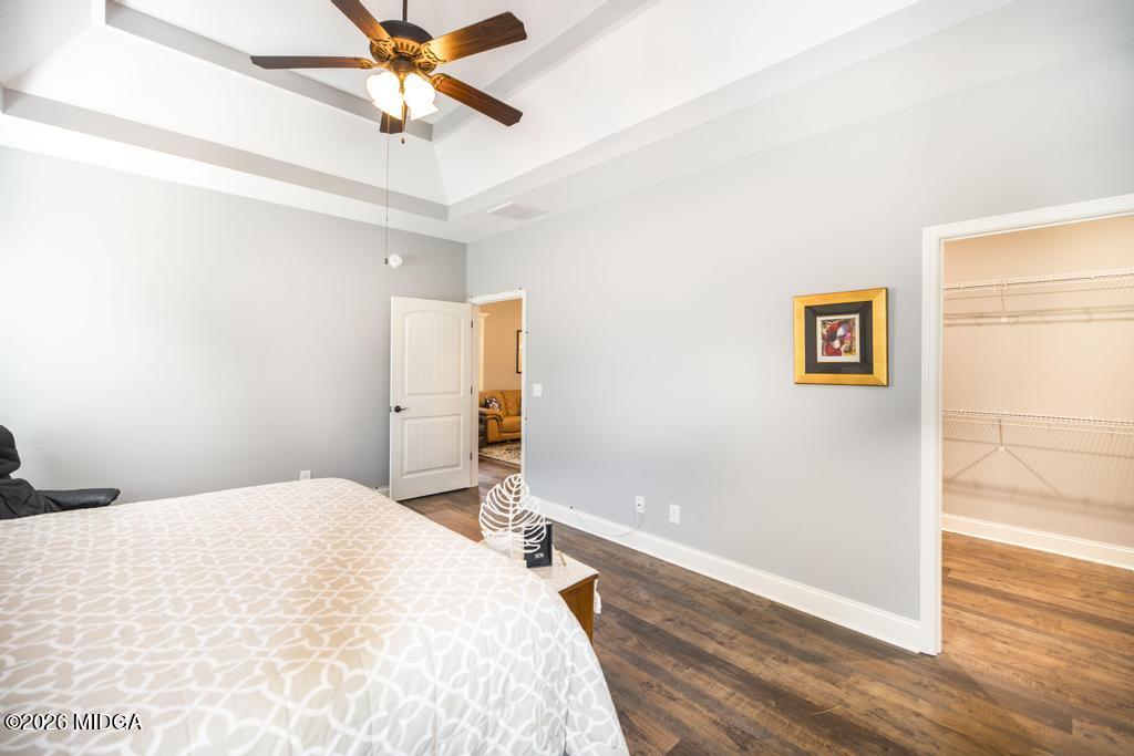 137 Shady Oak Drive Perry, GA 31069 - Photo 23 of 37 a bedroom with a bed and a window