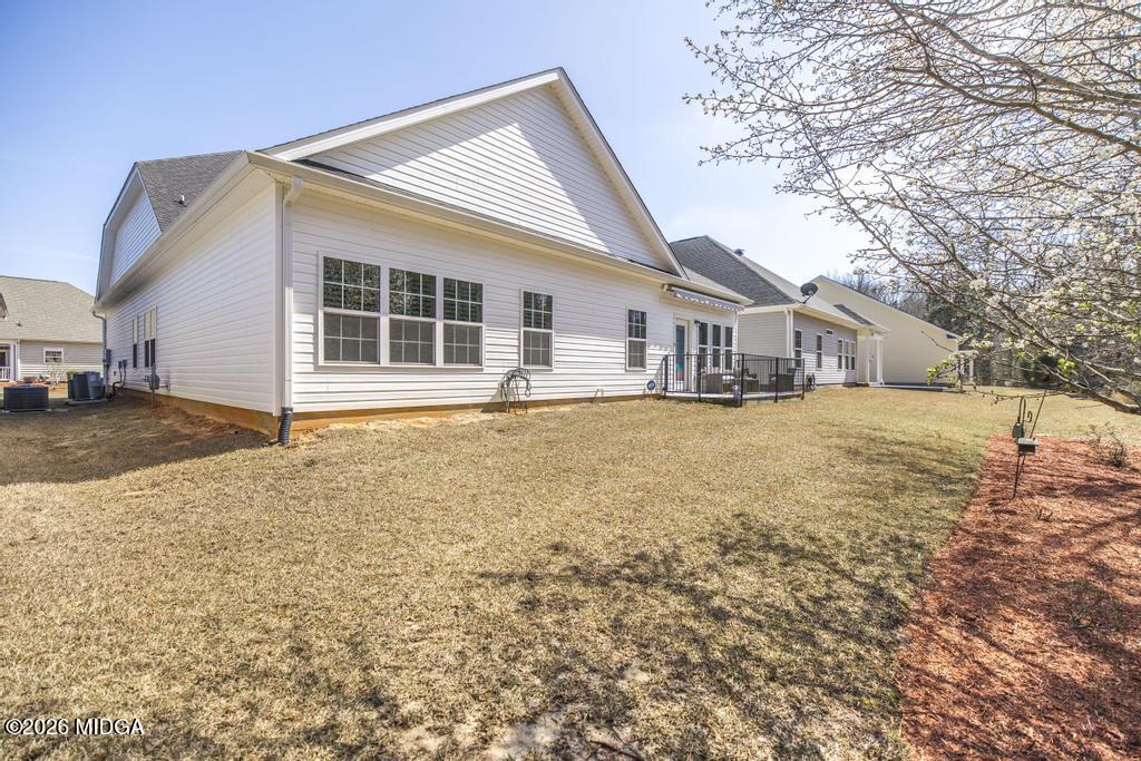 137 Shady Oak Drive Perry, GA 31069 - Photo 36 of 37 a view of a house with a yard covered in snow