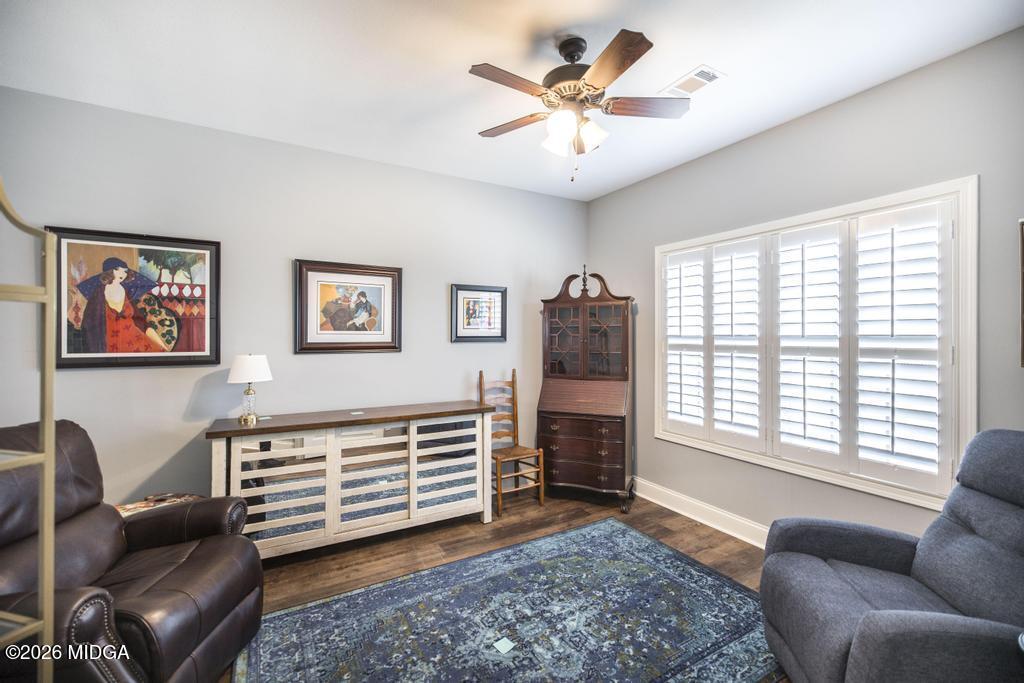 137 Shady Oak Drive Perry, GA 31069 - Photo 7 of 37 a living room with furniture and a large window