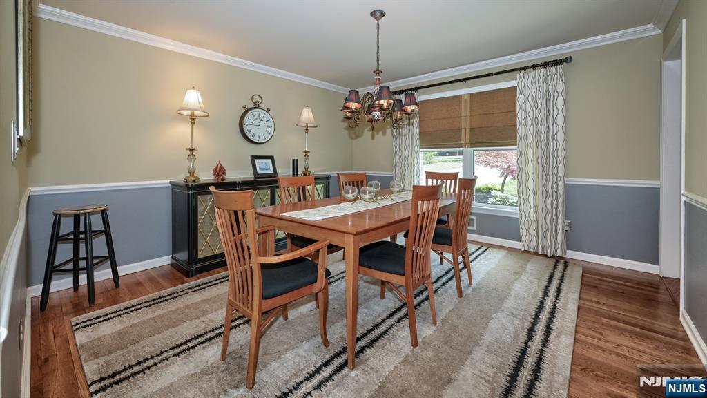 23 Erli Street Wayne, NJ 07470 - Photo 20 of 49 a view of a dining room with furniture window and wooden floor