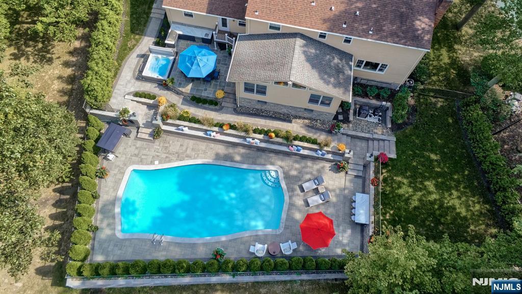 23 Erli Street Wayne, NJ 07470 - Photo 2 of 49 an aerial view of residential houses with outdoor space and swimming pool
