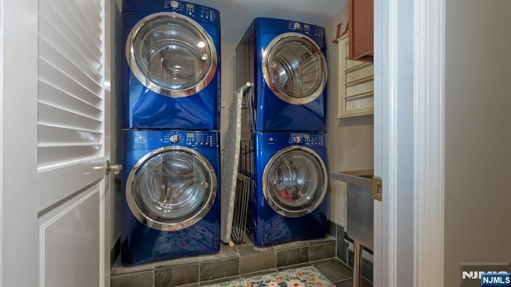 23 Erli Street Wayne, NJ 07470 - Photo 23 of 49 a view of washer and dryer in a utility room