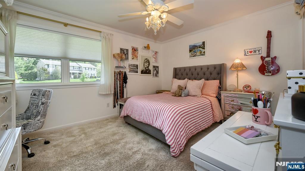 23 Erli Street Wayne, NJ 07470 - Photo 30 of 49 a bedroom with a bed and a window