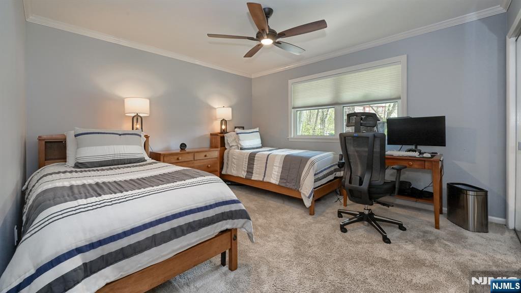23 Erli Street Wayne, NJ 07470 - Photo 34 of 49 a bedroom with two beds and a desk