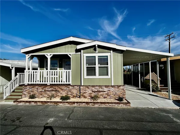 a front view of a house with a garage