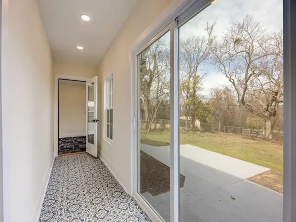 a bathroom with a bathtub and shower