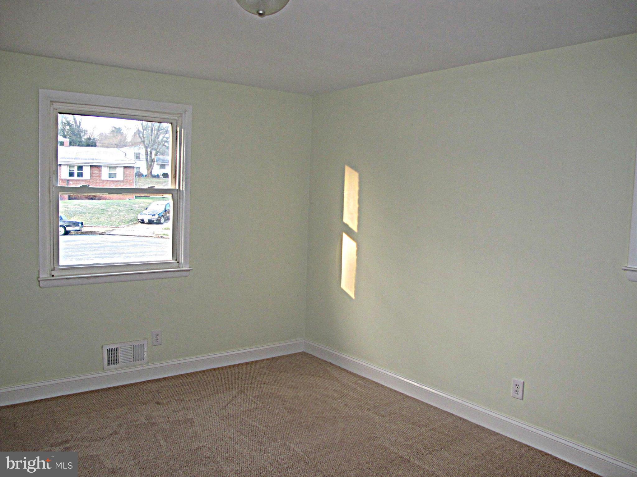 8910 Maplebrook Road Randallstown, MD 21133 - Photo 16 of 18 an empty room with a window