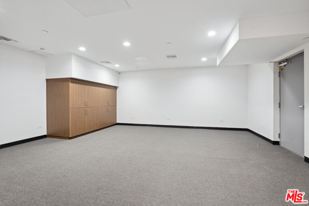 1746 Garfield Place, Unit 101 Los Angeles, CA 90028 - Photo 18 of 28 a view of an empty room