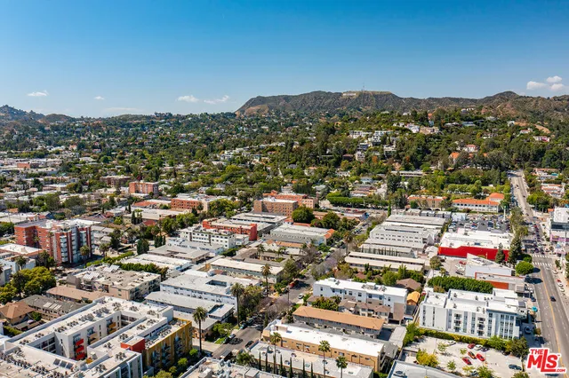 an aerial view of a city with lots of residential buildings
