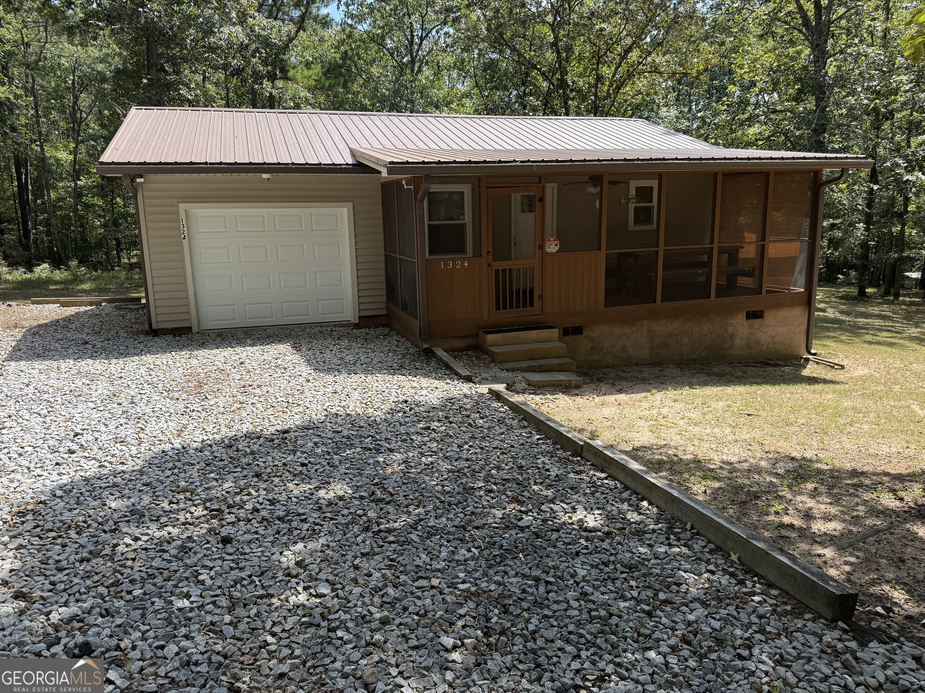 1324 Lbk Road Tignall, GA 30668 - Photo 1 of 1 a view of a house