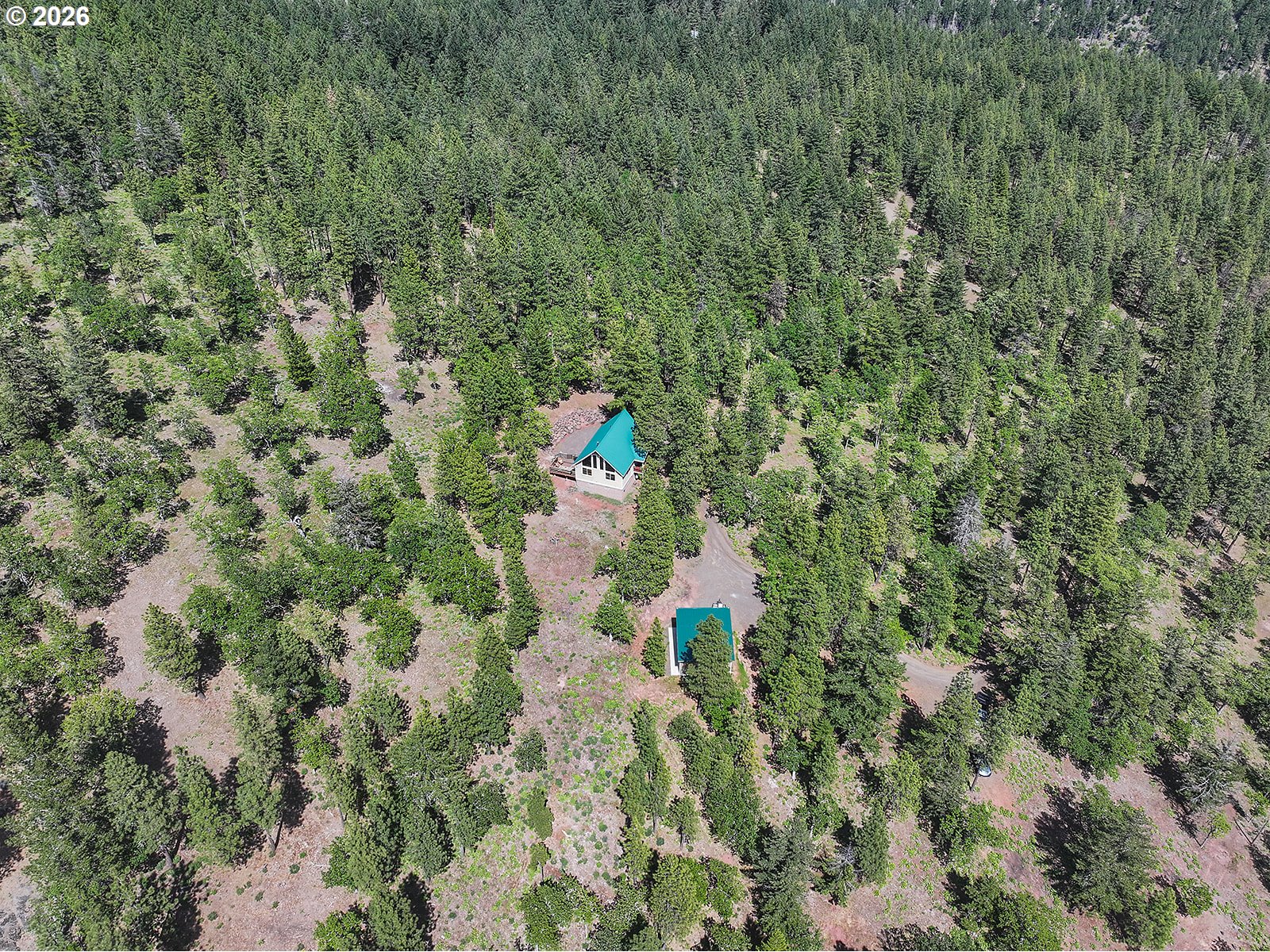 Thompson Trail Goldendale, WA 98620 - Photo 7 of 15 a close up of a house with a yard and lake view