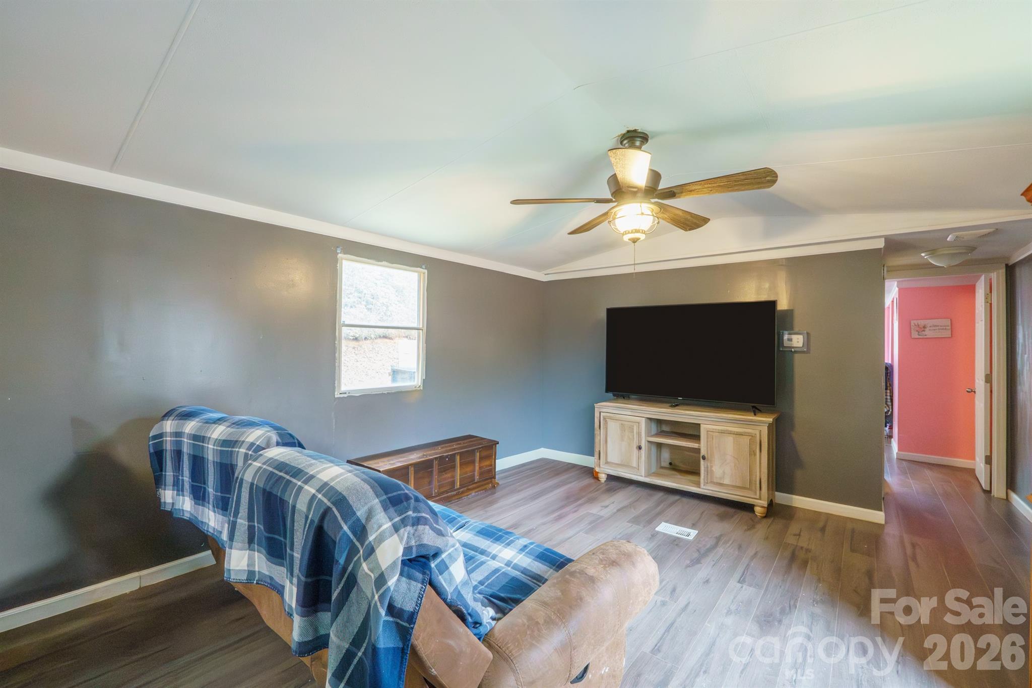1775 Highway 70 Morganton, NC 28655 - Photo 11 of 18 a living room with furniture and a flat screen tv