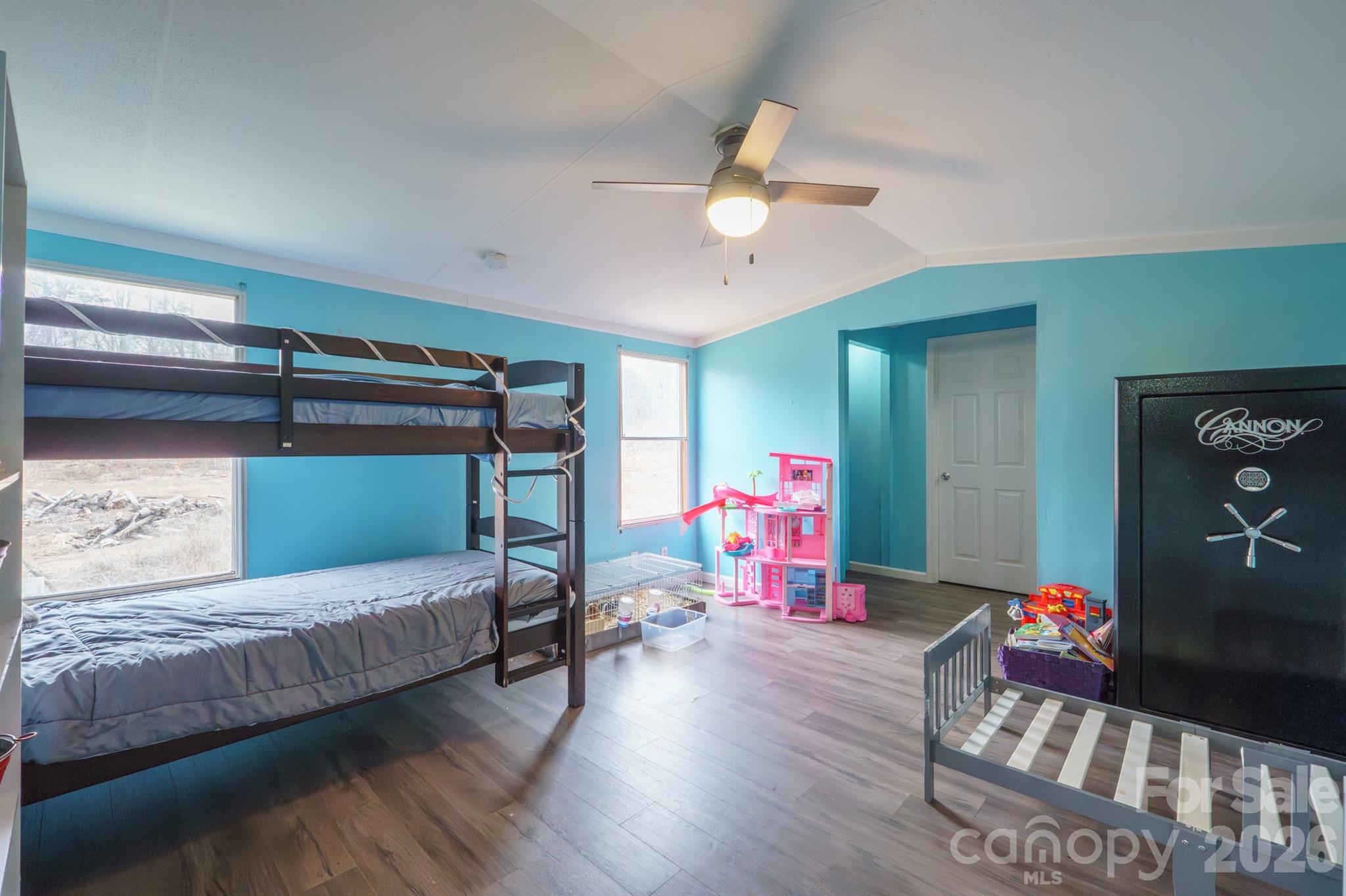 1775 Highway 70 Morganton, NC 28655 - Photo 16 of 18 a bedroom with a bed and wooden floor