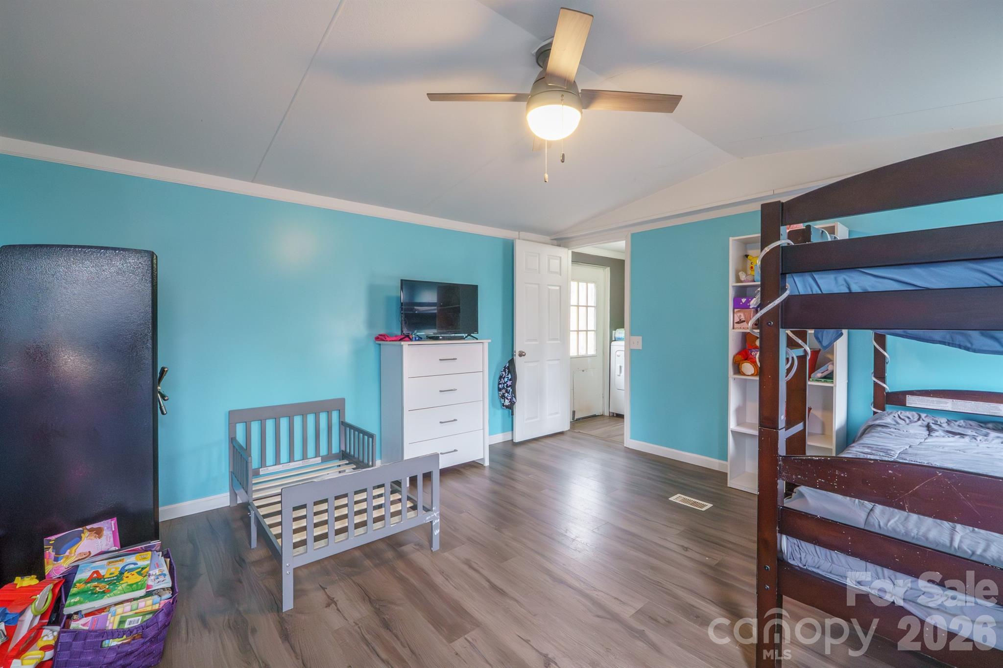 1775 Highway 70 Morganton, NC 28655 - Photo 17 of 18 a living room with furniture and a flat screen tv