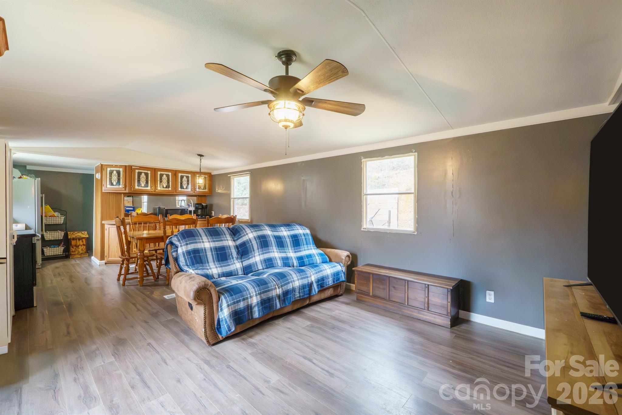 1775 Highway 70 Morganton, NC 28655 - Photo 5 of 18 a living room with furniture a ceiling fan and a window