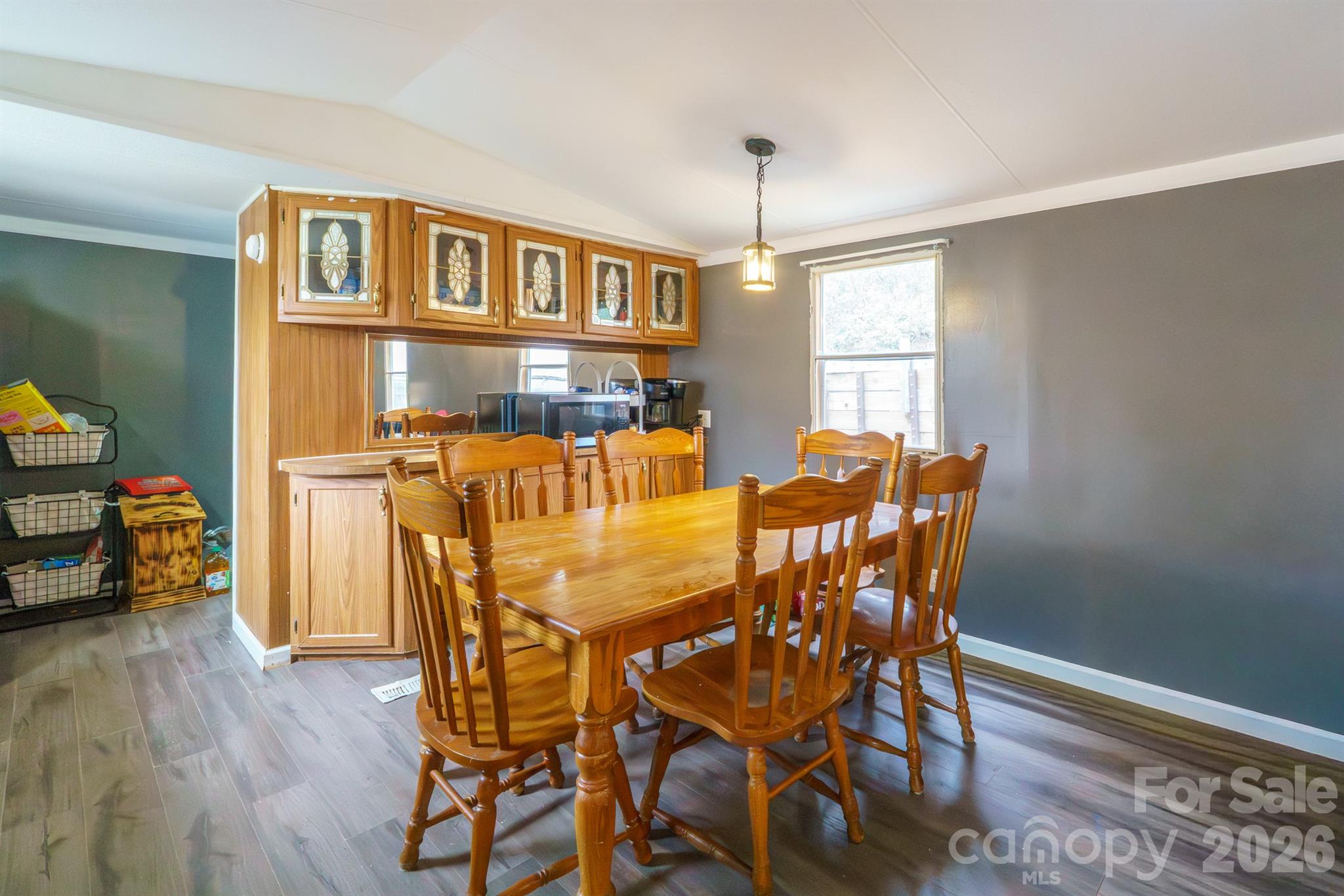 1775 Highway 70 Morganton, NC 28655 - Photo 6 of 18 a view of a dining room with furniture window and wooden floor