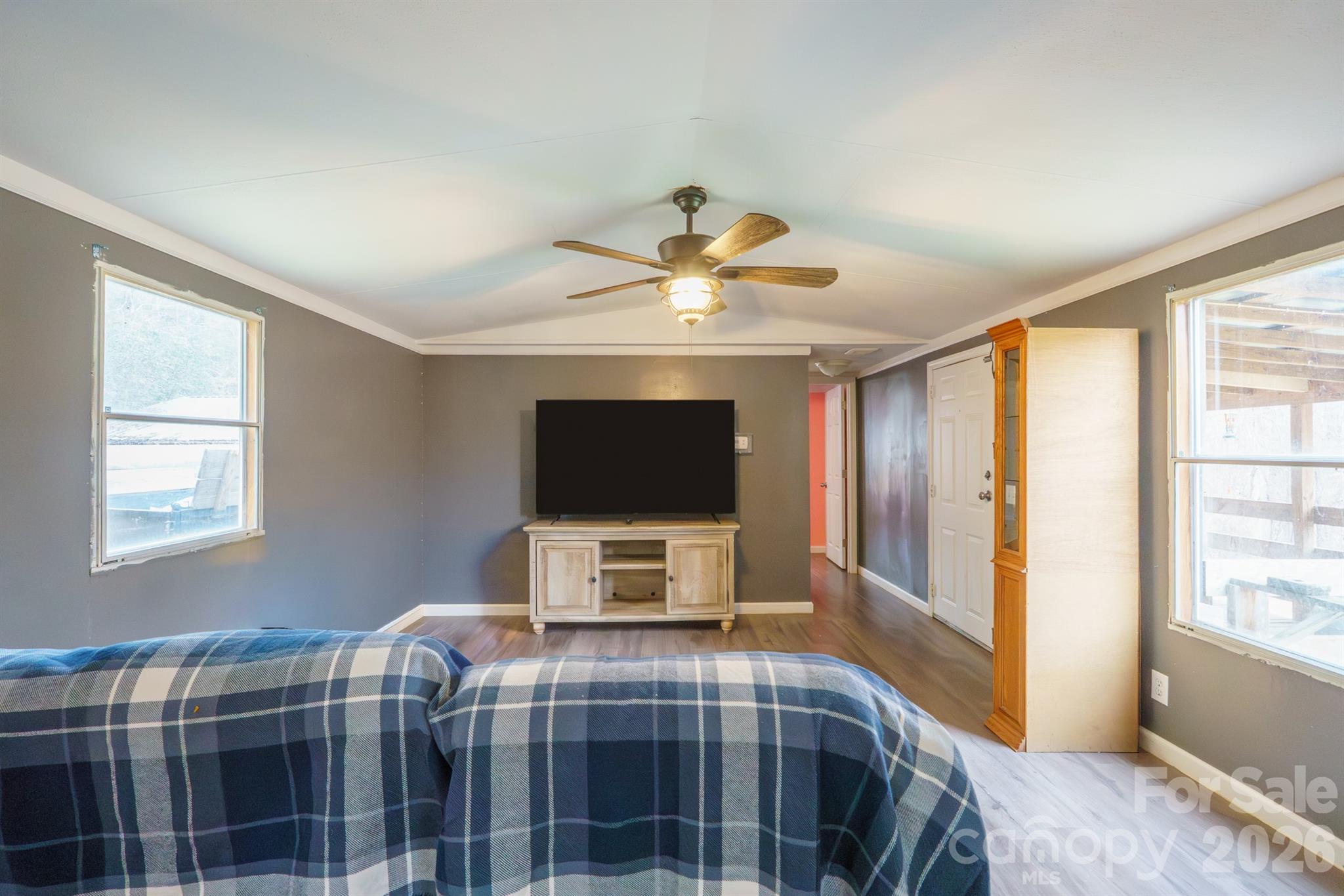 1775 Highway 70 Morganton, NC 28655 - Photo 10 of 18 a bedroom with a bed and a flat screen tv