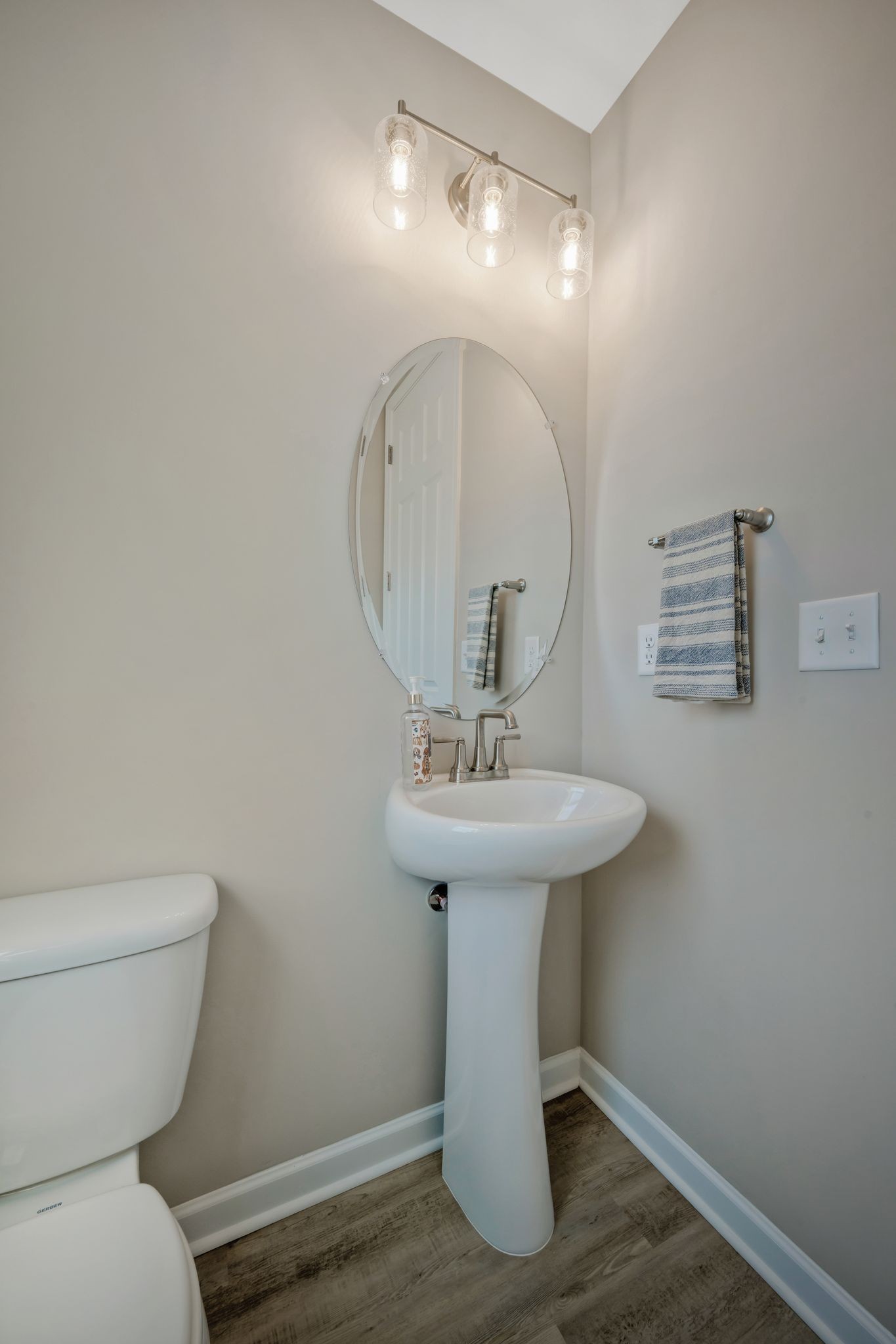 147 Timber Crest Trail White Bluff, TN 37187 - Photo 14 of 29 a bathroom with a sink toilet and a mirror