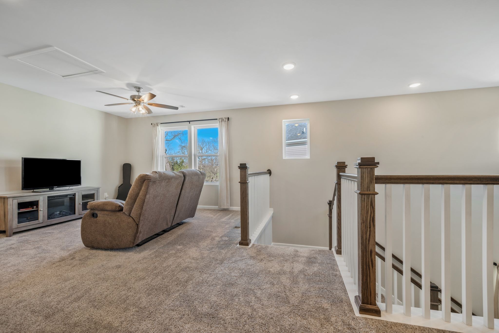 147 Timber Crest Trail White Bluff, TN 37187 - Photo 15 of 29 a living room with furniture and a flat screen tv