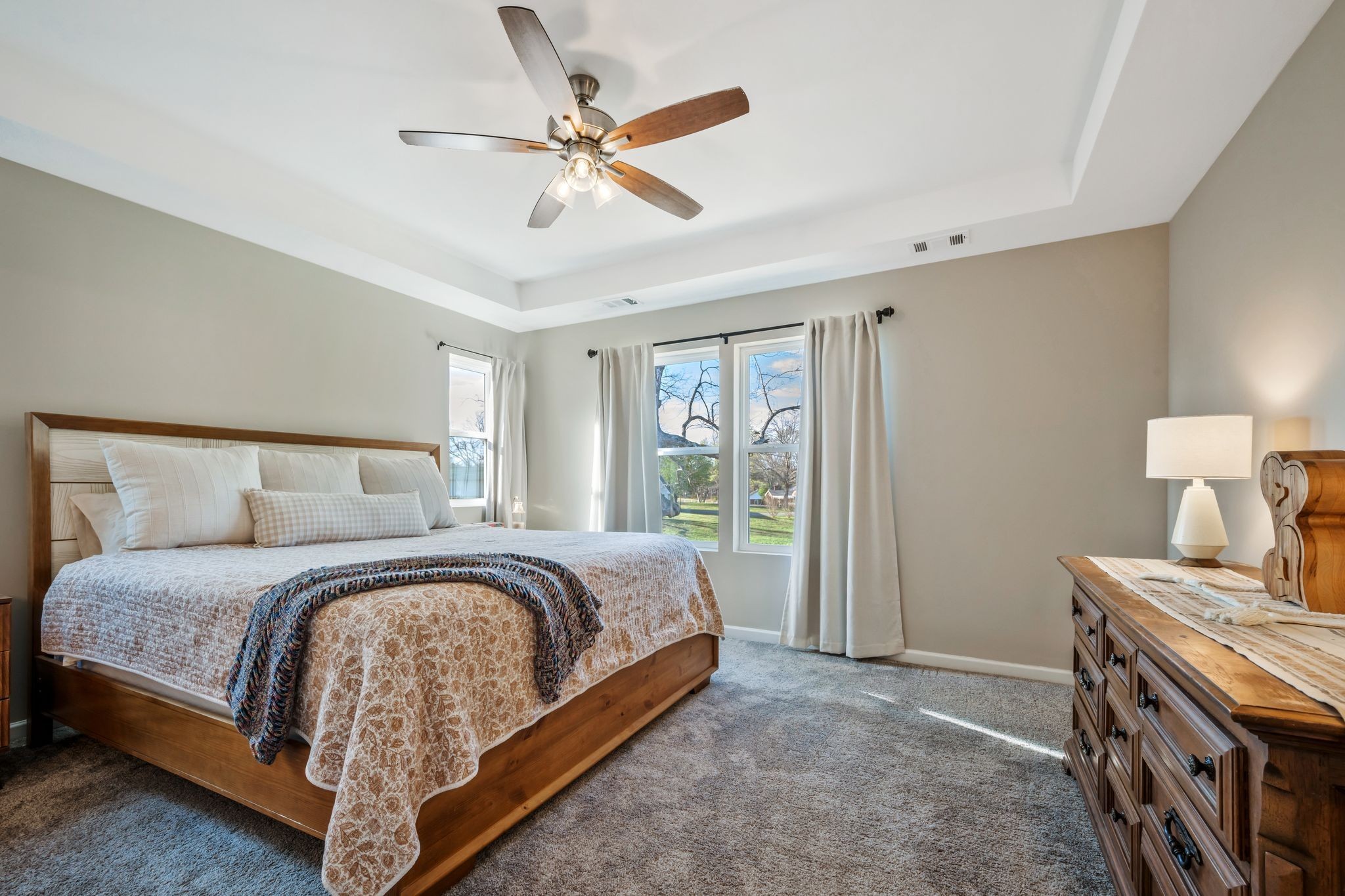 147 Timber Crest Trail White Bluff, TN 37187 - Photo 17 of 29 a bedroom with a bed and a chandelier