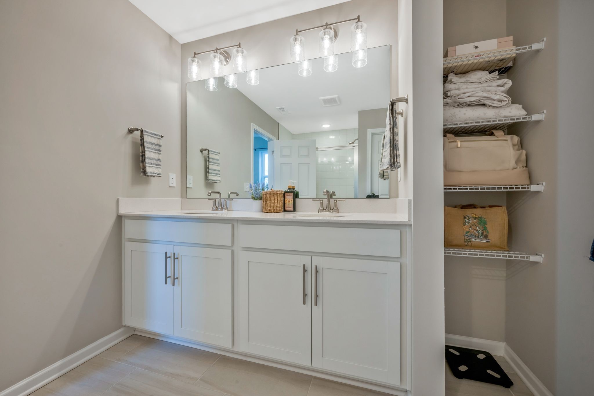 147 Timber Crest Trail White Bluff, TN 37187 - Photo 20 of 29 a bathroom with a sink and a mirror