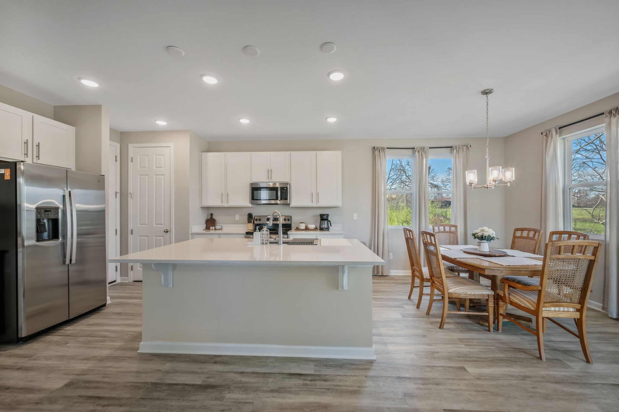 147 Timber Crest Trail White Bluff, TN 37187 - Photo 3 of 29 a view of kitchen with cabinets table and chairs