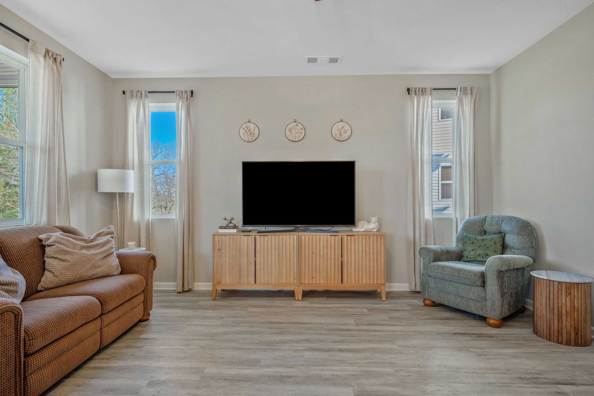 147 Timber Crest Trail White Bluff, TN 37187 - Photo 7 of 29 a living room with furniture and a flat screen tv