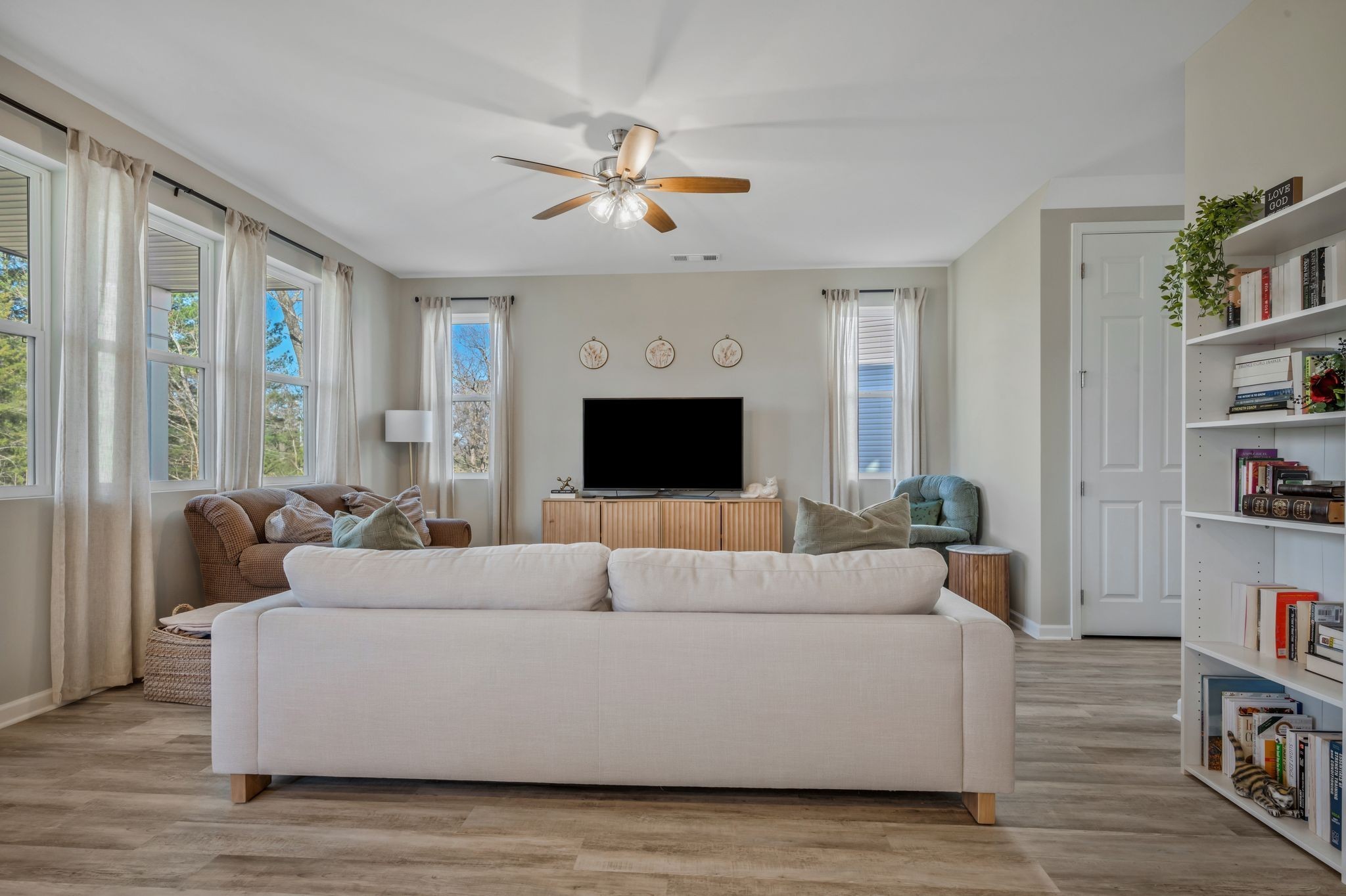 147 Timber Crest Trail White Bluff, TN 37187 - Photo 8 of 29 a living room with furniture and a flat screen tv