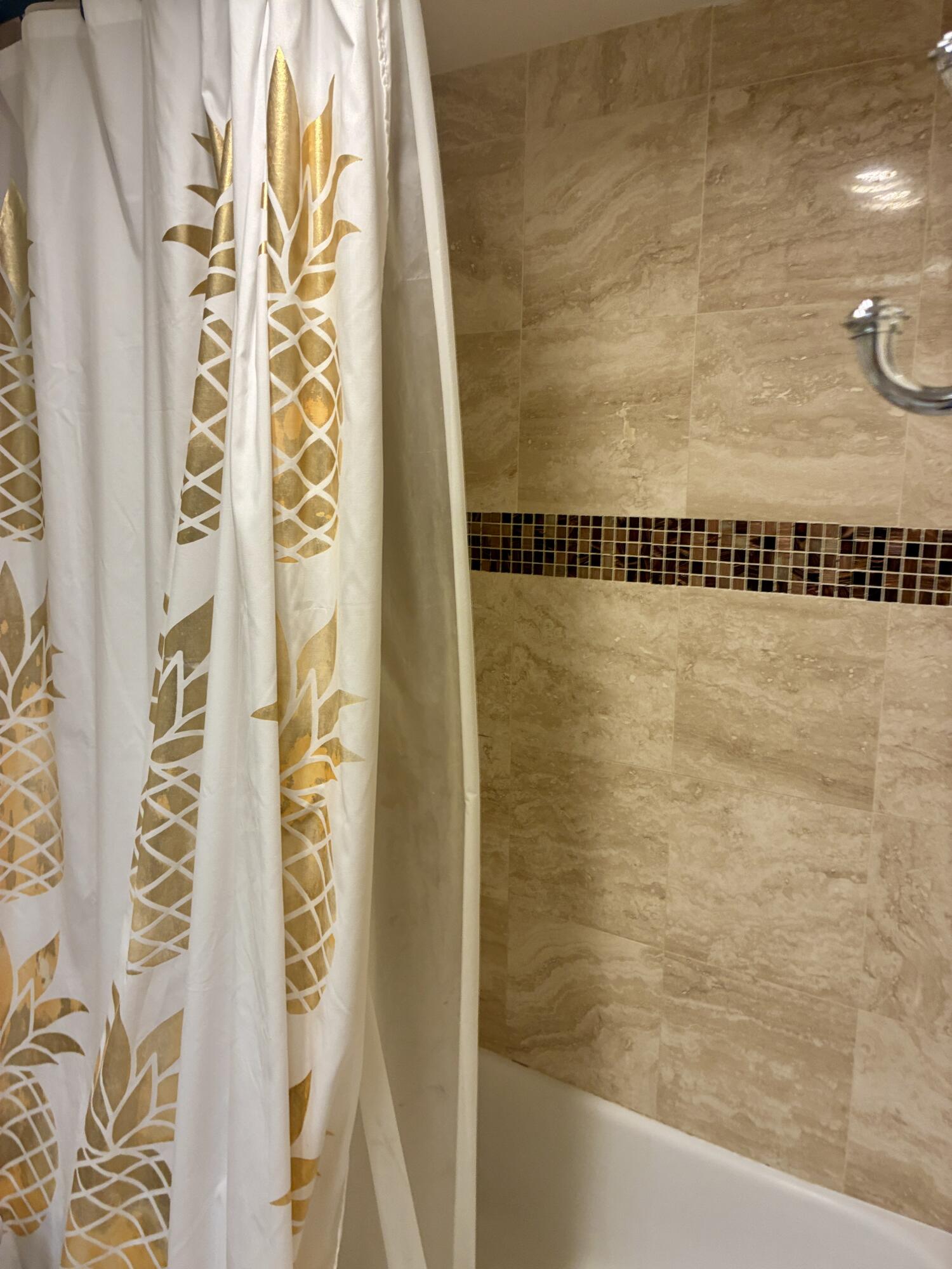 2691 South Course Drive, Unit 409 Pompano Beach, FL 33069 - Photo 11 of 22 a bathroom with a shower