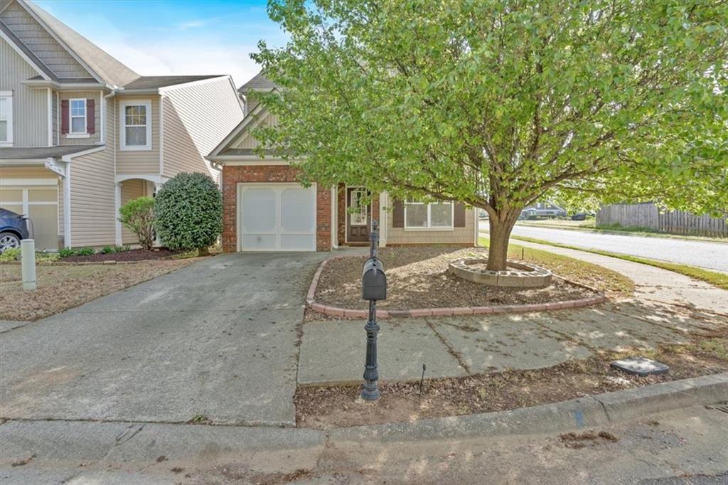 200 Arrowhead Lane Canton, GA 30114 - Photo 1 of 1 a front view of a house with a yard