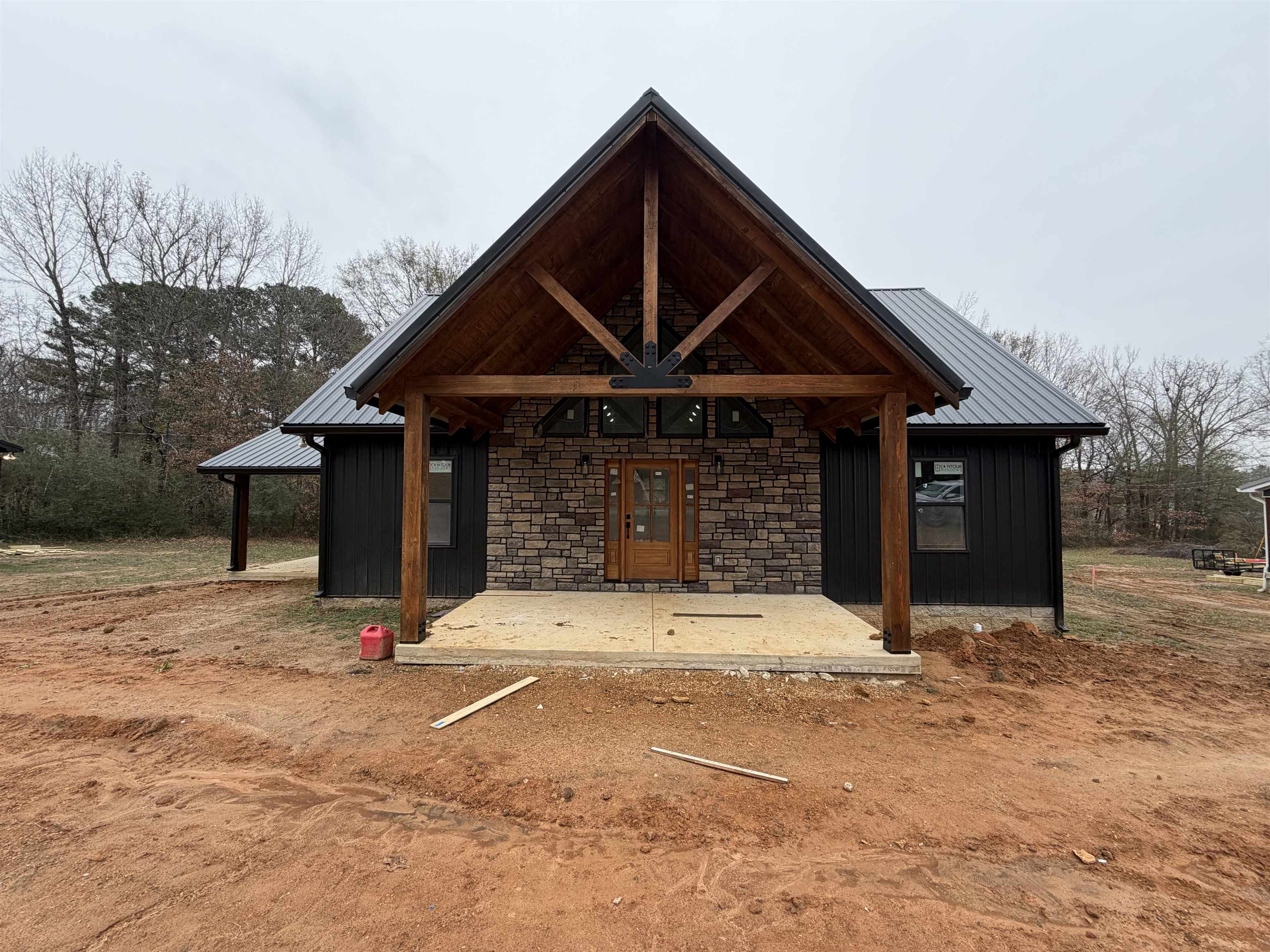 a front view of a house with yard