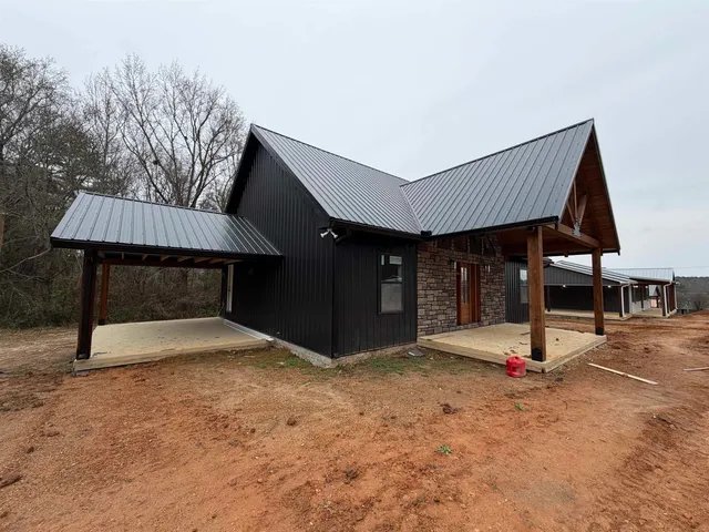 a view of a house with entertaining space