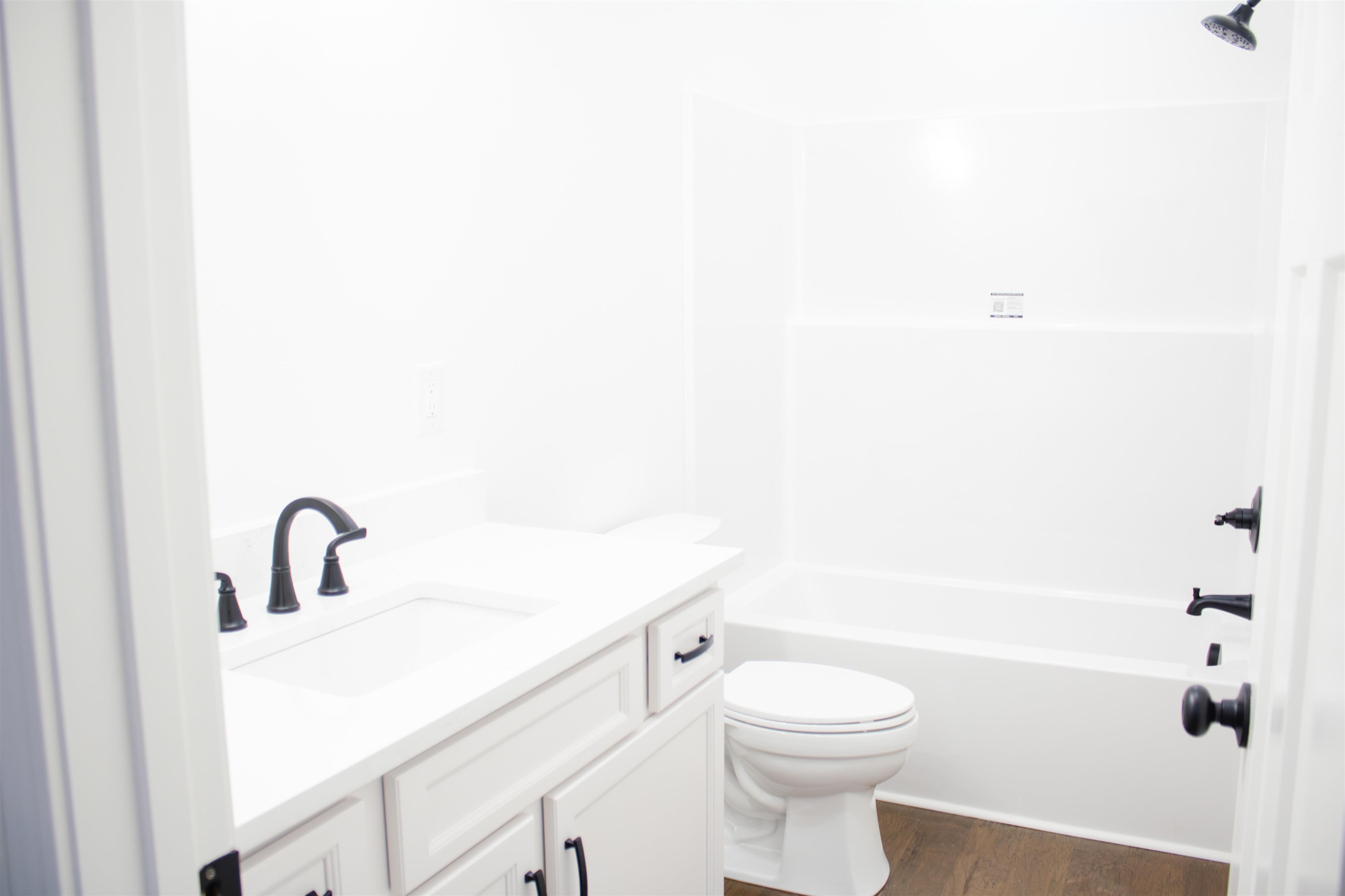 273 Oakgrove Road Selmer, TN 38375 - Photo 8 of 17 a bathroom with a sink a toilet and shower