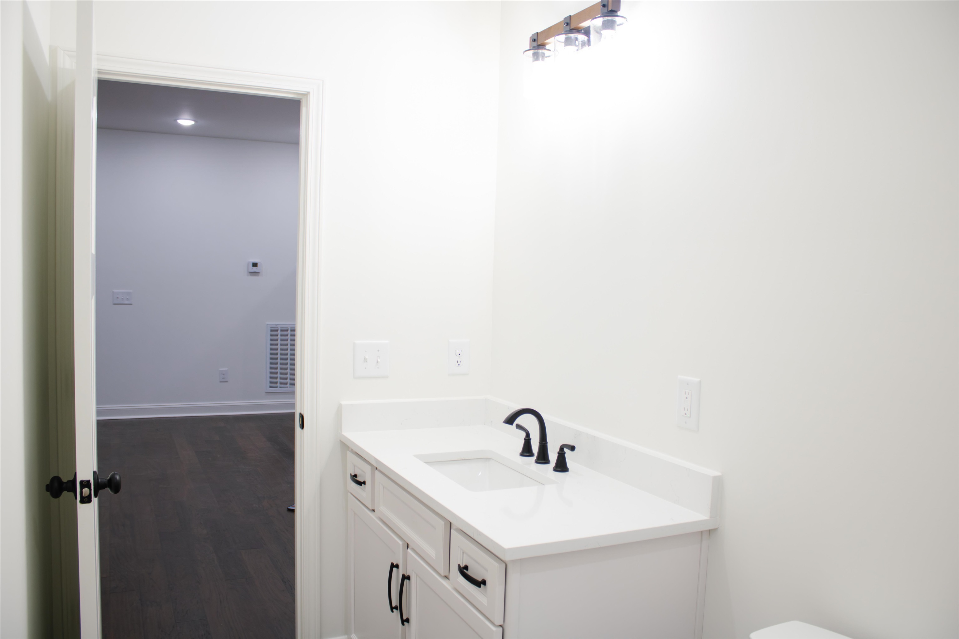 273 Oakgrove Road Selmer, TN 38375 - Photo 9 of 17 a bathroom with a sink and mirror