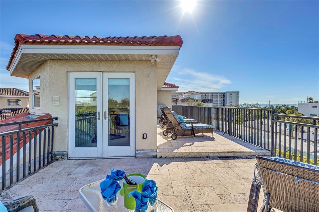 436 Canal Road, Unit A Sarasota, FL 34242 - Photo 67 of 94 a view of a patio with a table and chairs
