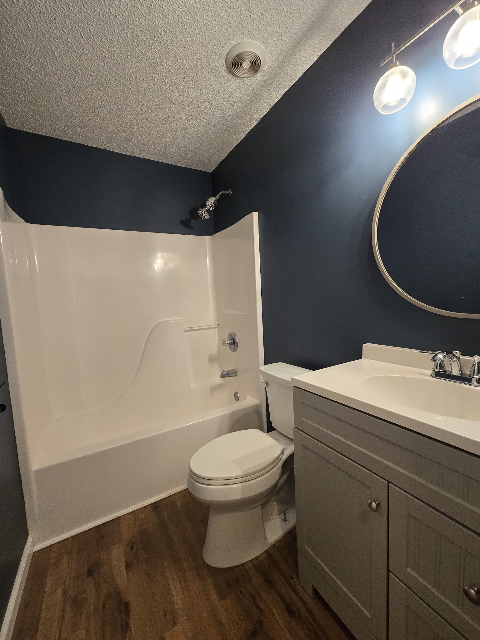 337 Bumpus Mill Road Oak Grove, KY 42262 - Photo 12 of 22 a bathroom with a granite countertop toilet sink and mirror