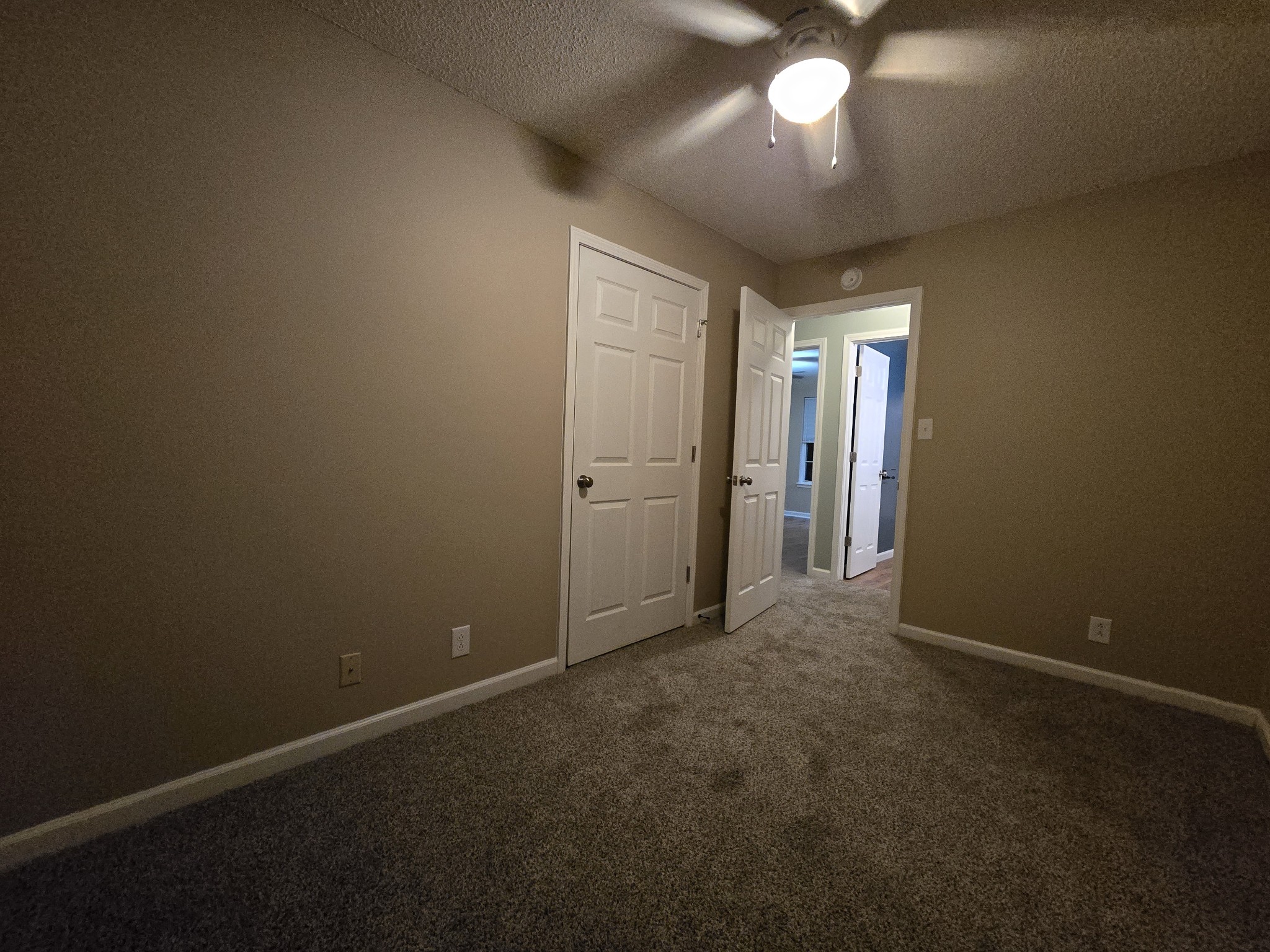 337 Bumpus Mill Road Oak Grove, KY 42262 - Photo 15 of 22 an empty room with a empty space and a ceiling fan