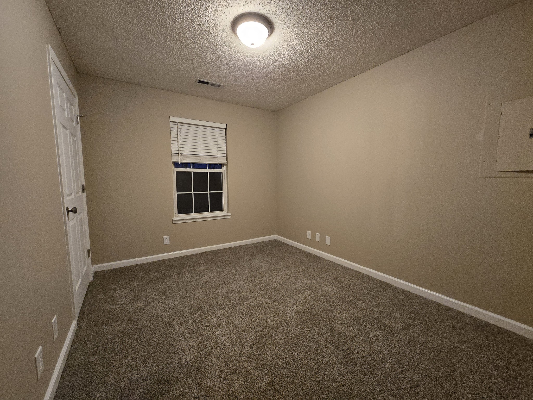 337 Bumpus Mill Road Oak Grove, KY 42262 - Photo 16 of 22 an empty room with a window