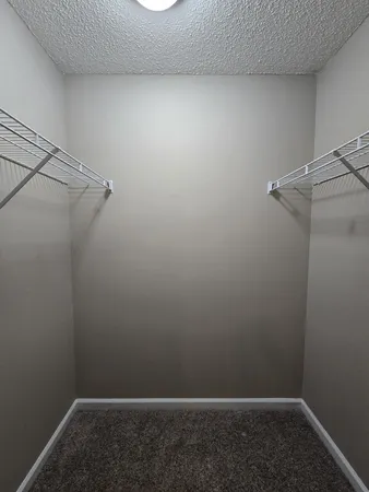 a view of a room with racks on the wall