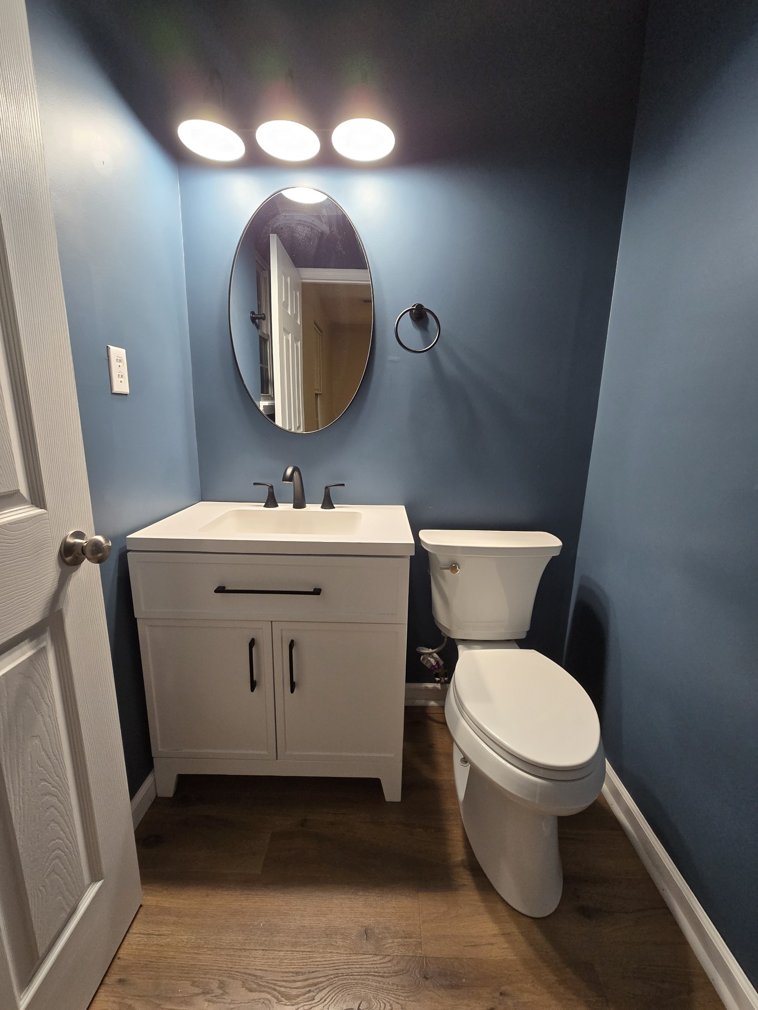 337 Bumpus Mill Road Oak Grove, KY 42262 - Photo 21 of 22 a bathroom with a toilet sink and mirror