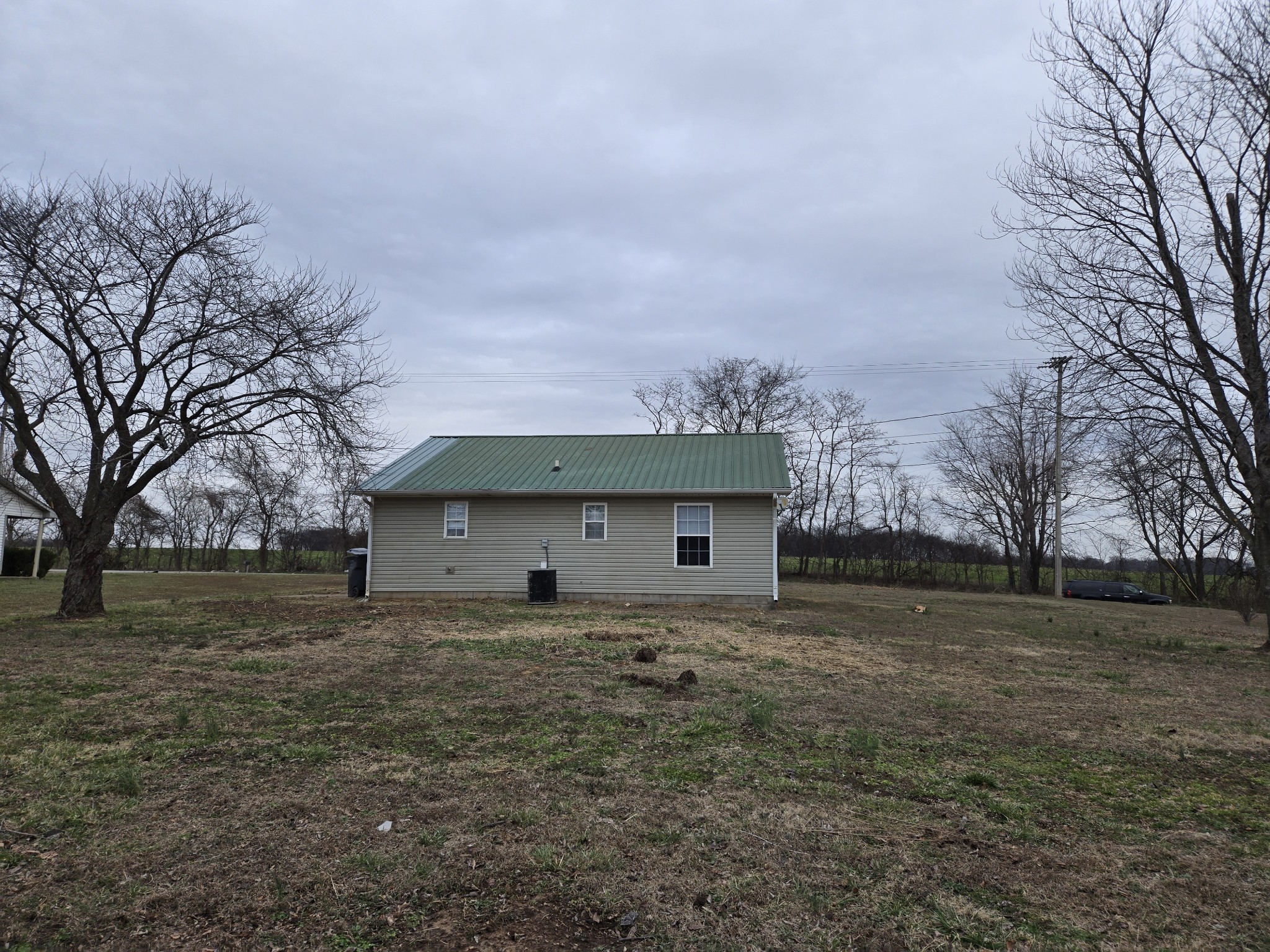 337 Bumpus Mill Road Oak Grove, KY 42262 - Photo 3 of 22 a front view of house with yard and trees